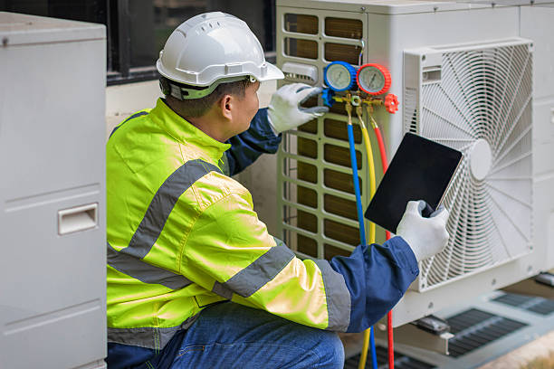 Professional Heat Pump Repair technician working in Carrollton, KY